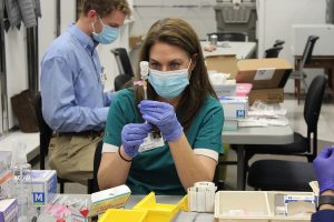 hcp preparing a vaccine